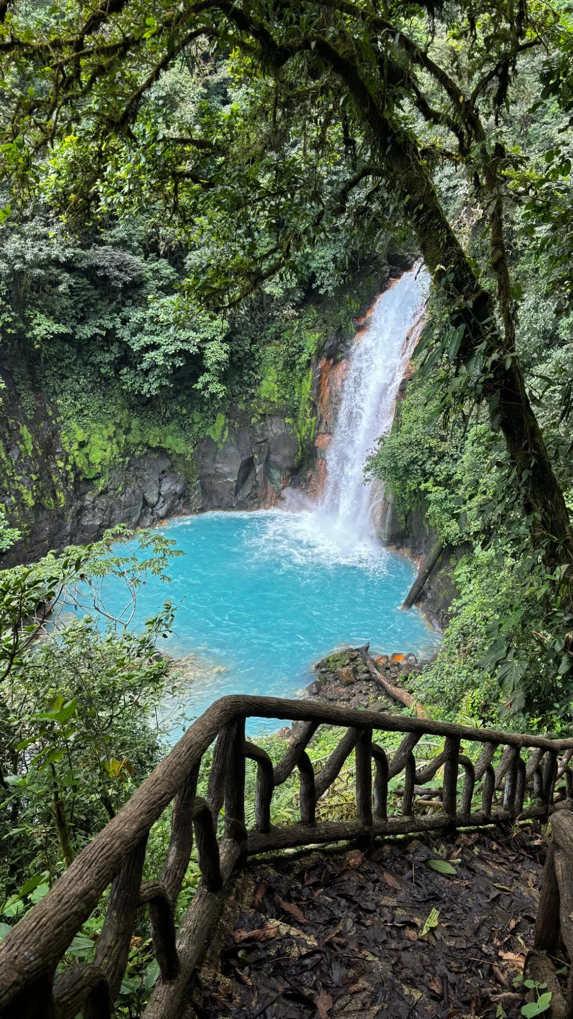 Beautiful waterfall and turquoise pool in Costa Rica